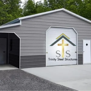Custom metal building with dual side lean-tos, roll-up doors, and walk-in door