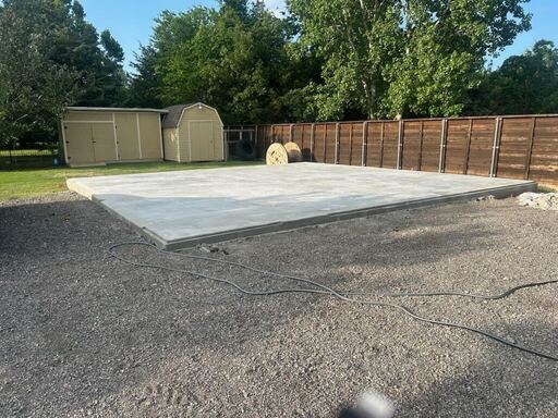 Finished concrete slab prepared for a metal building